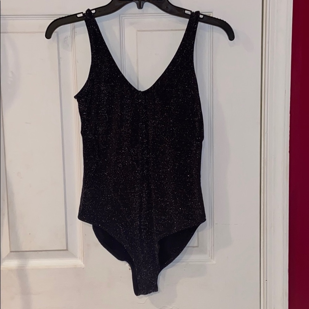 Sparkly black body suit